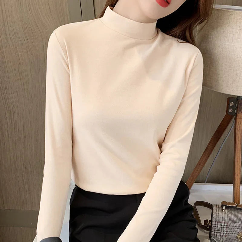 Comodo top semplice con scollo medio e maniche lunghe per donna