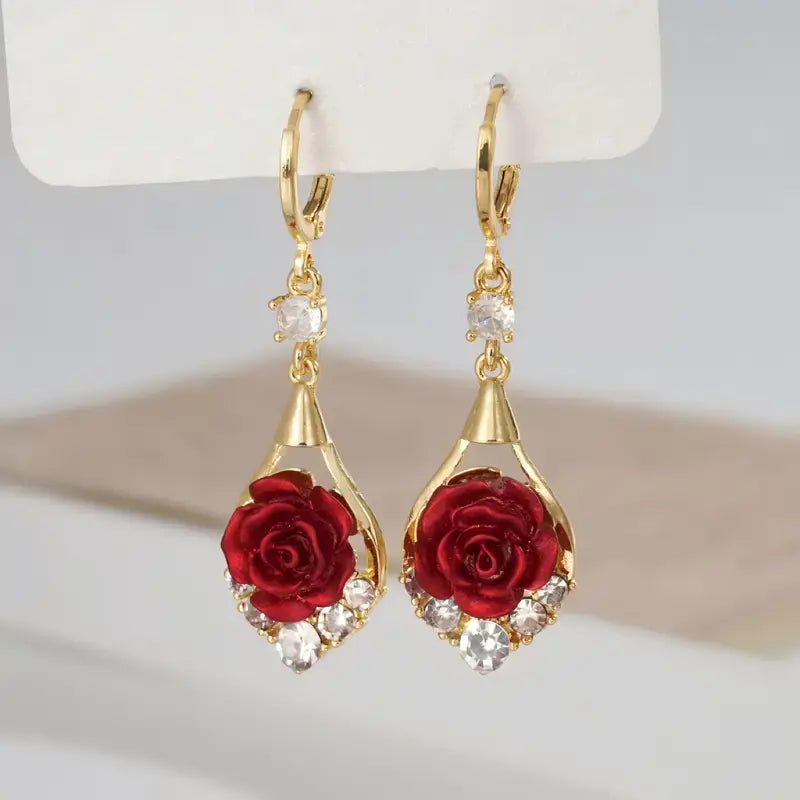 Eleganti orecchini pendenti con rosa