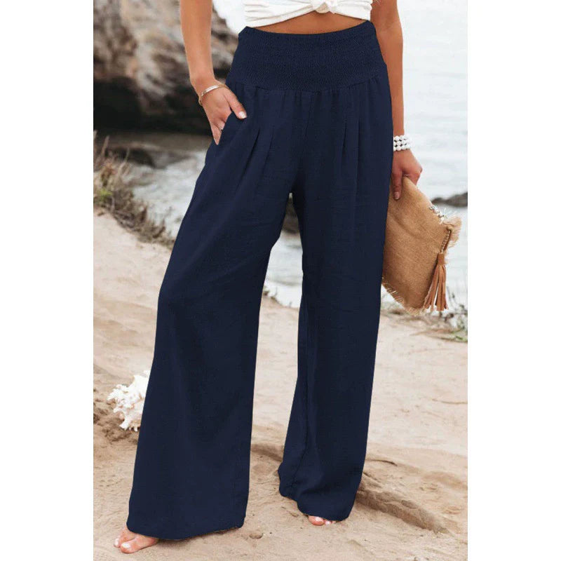 Pantaloni palazzo da donna a gamba larga con vita smockata
