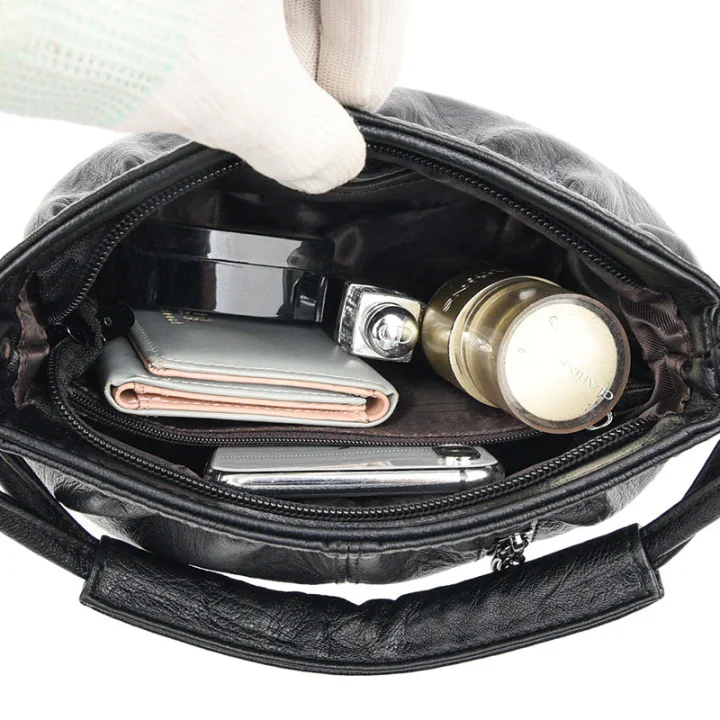 Borsa da donna plissettata in materiale morbido – Versatile, può essere portata a mano, a tracolla o a spalla 👜✨