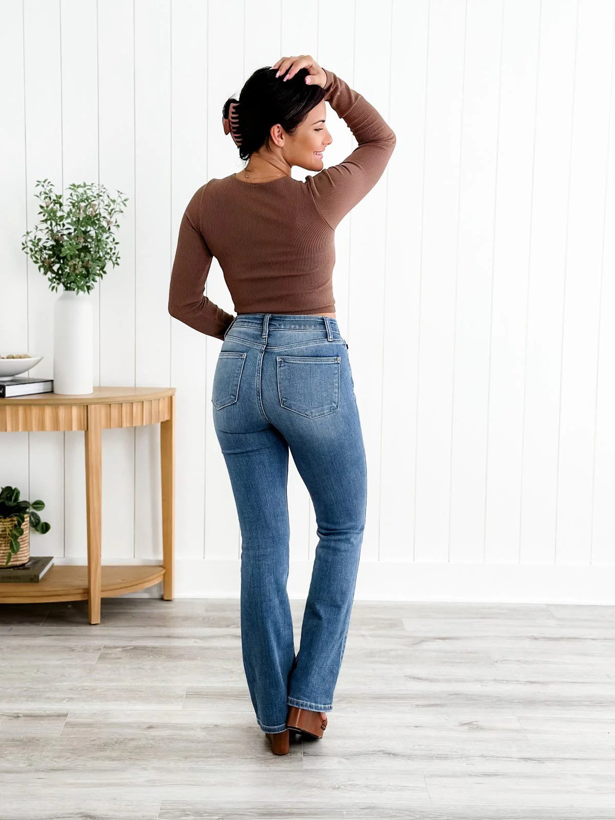 Jeans bootcut con controllo del fondoschiena