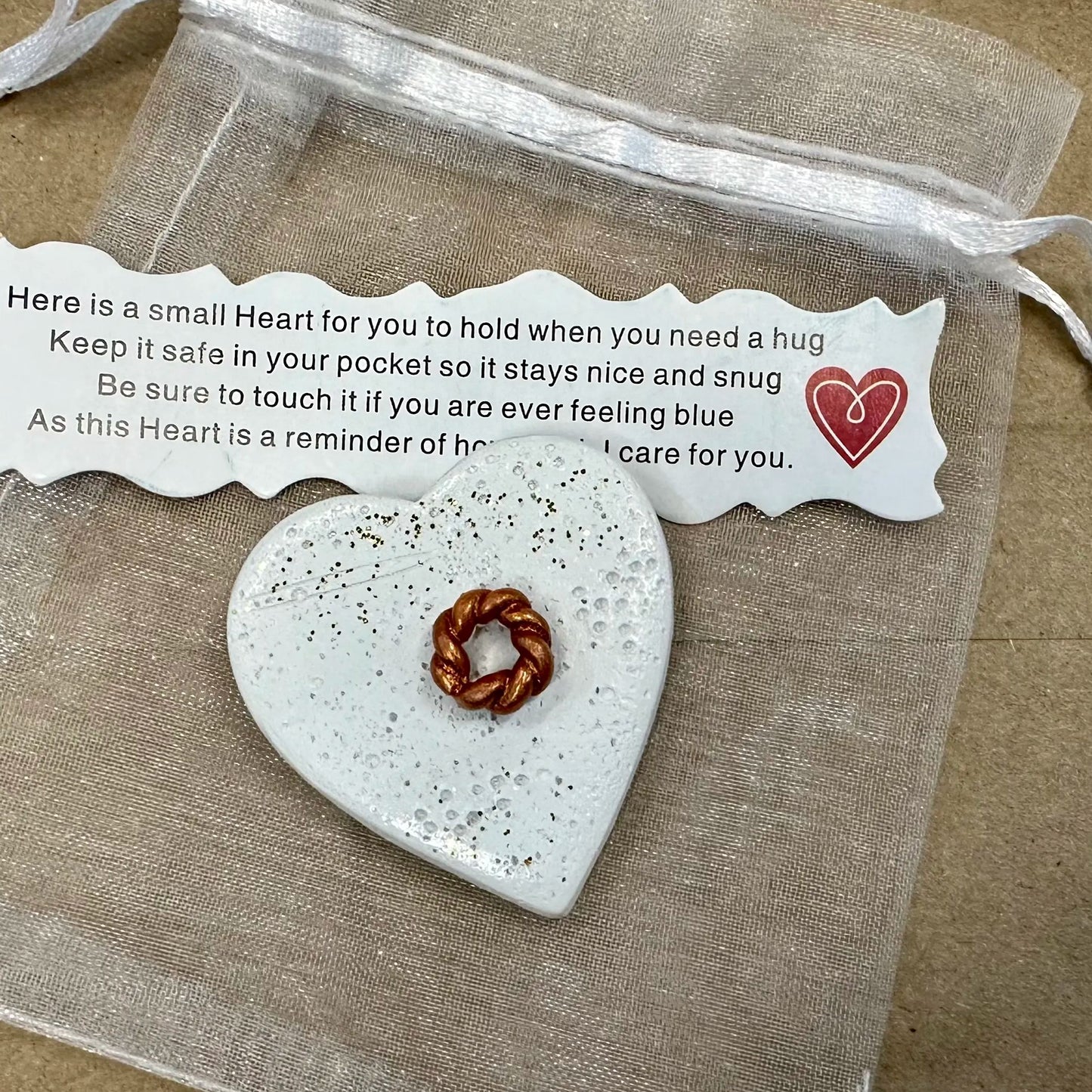 Abbraccio del cuore tascabile