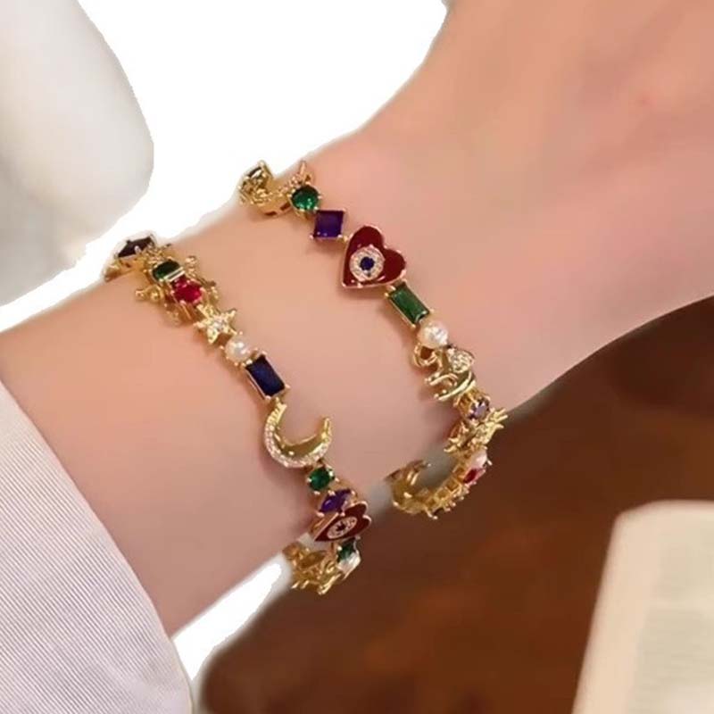 💫✨ Braccialetto “Celestial Charm” – Sole, Luna, Stelle, cristalli multicolori